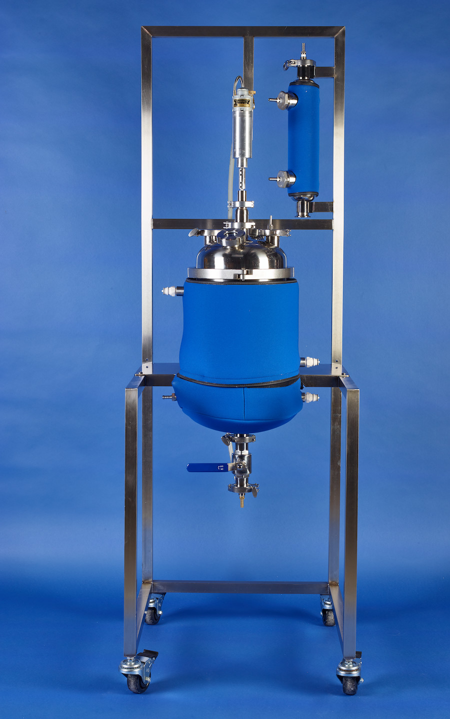 B/R liquid-liquid extractor, a jacketed stainless vessel with air stirrer and condenser on a stainless frame